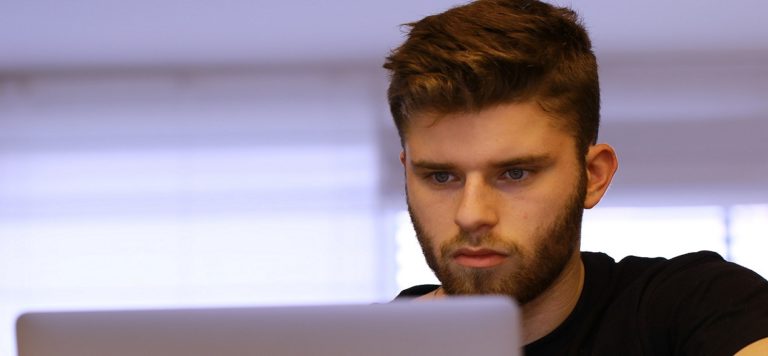 Oxford Media and Business School - boy studying at laptop