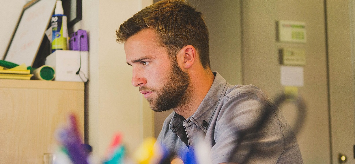 Oxford Media & Business School - boy In bedroom Studying 1230x570