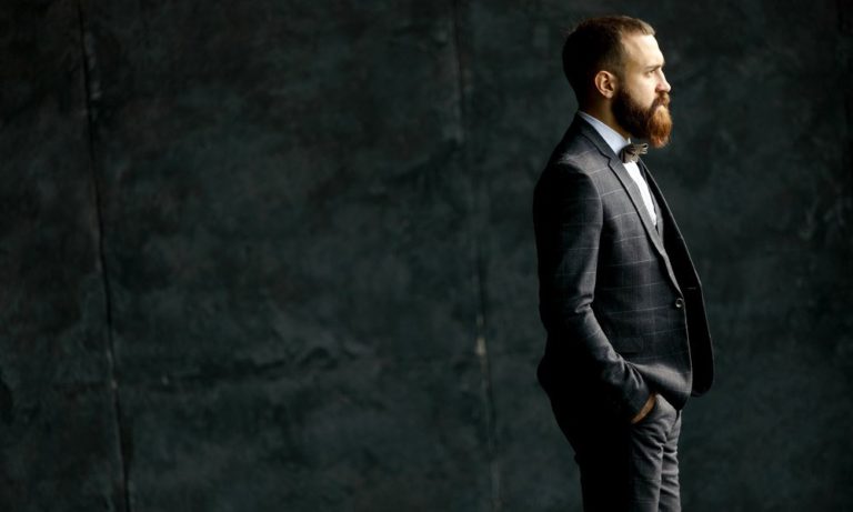 Oxford Media and Business School - bearded man in a suit