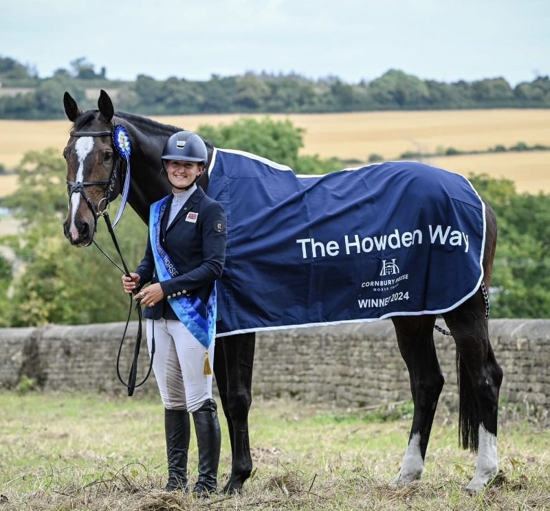 Young professional rider with horse