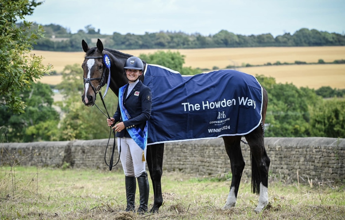 Young professional rider with horse